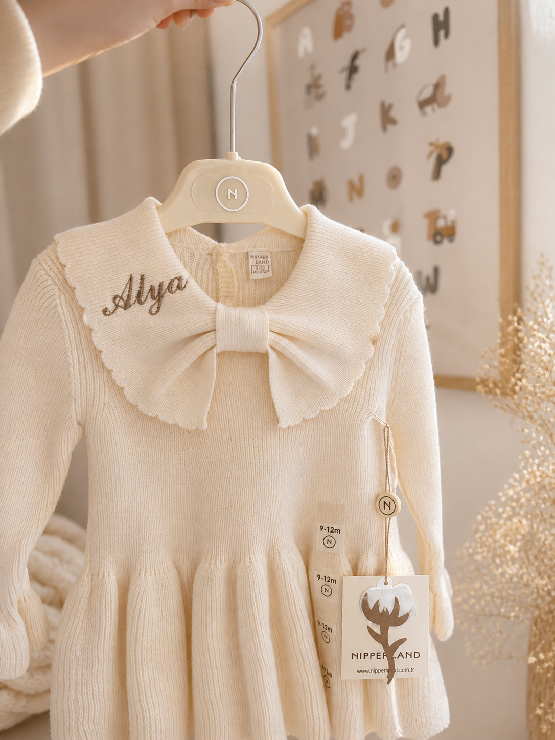 Strickkleid mit Schleife in Creme